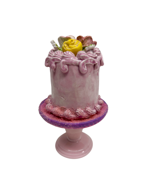 Flower Topped Pink Cake On Pedestal 16