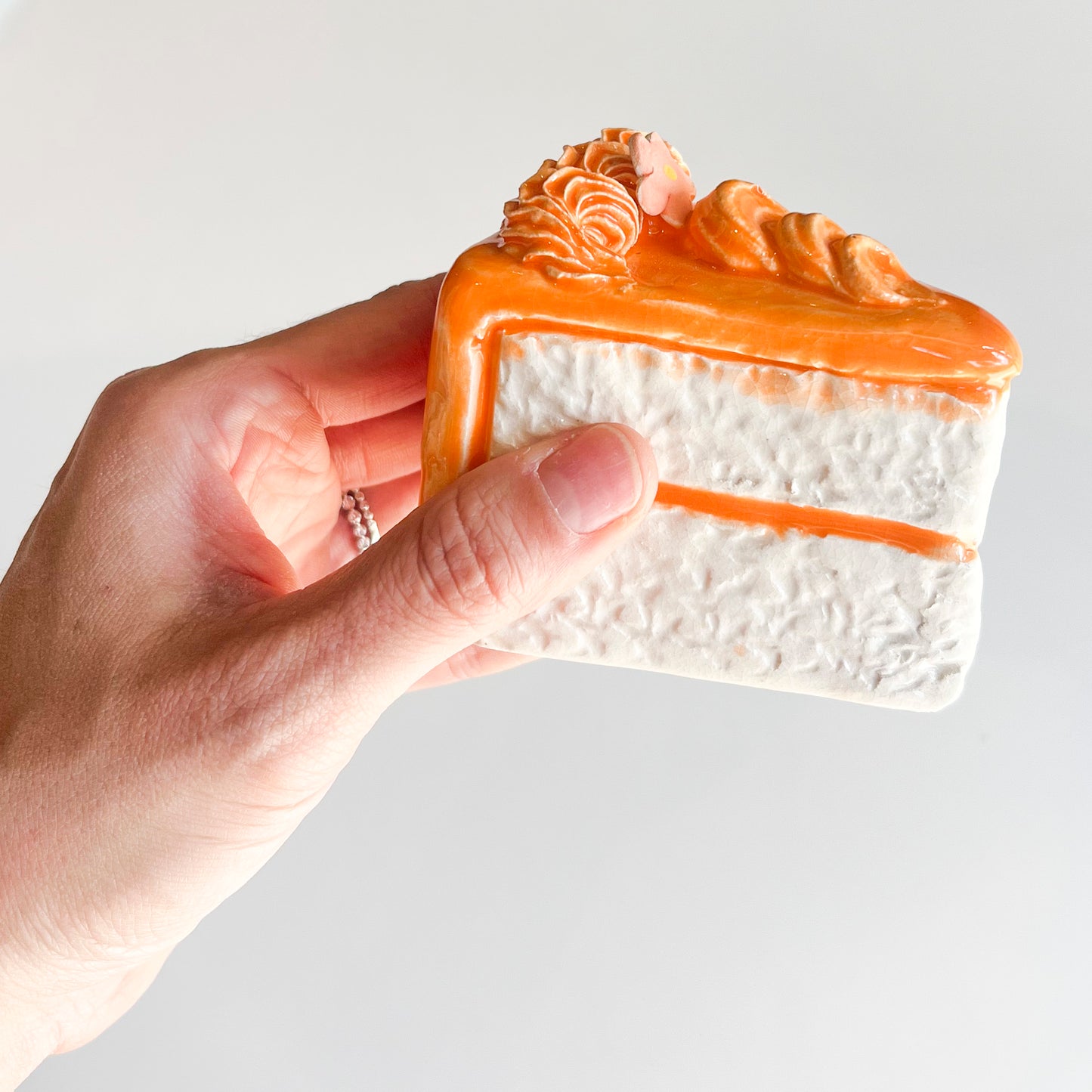 Orange Cake Slice With Medallion