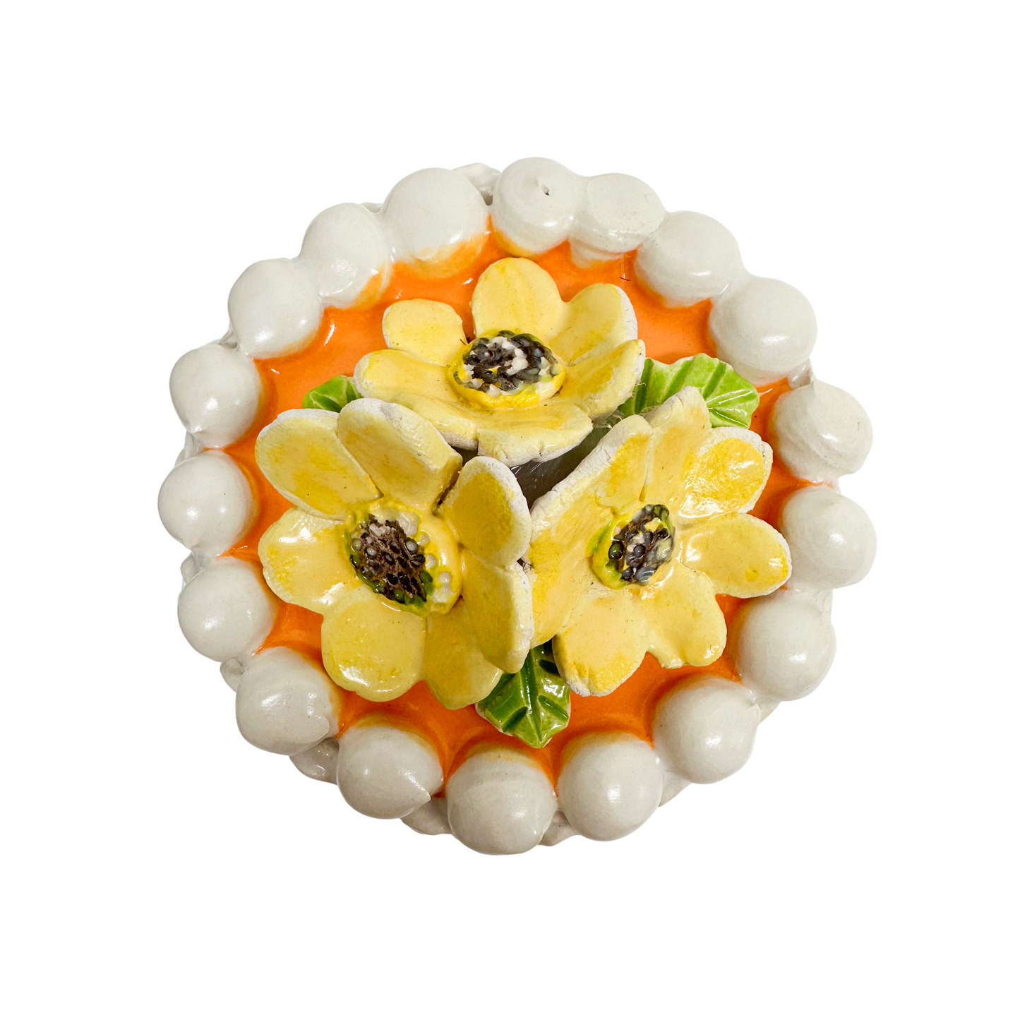 White Petite Cake With Orange Topping And Yellow Flowers